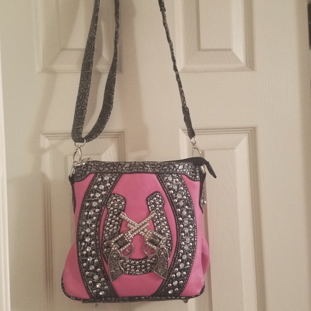 Leather purse with 2 guns on front